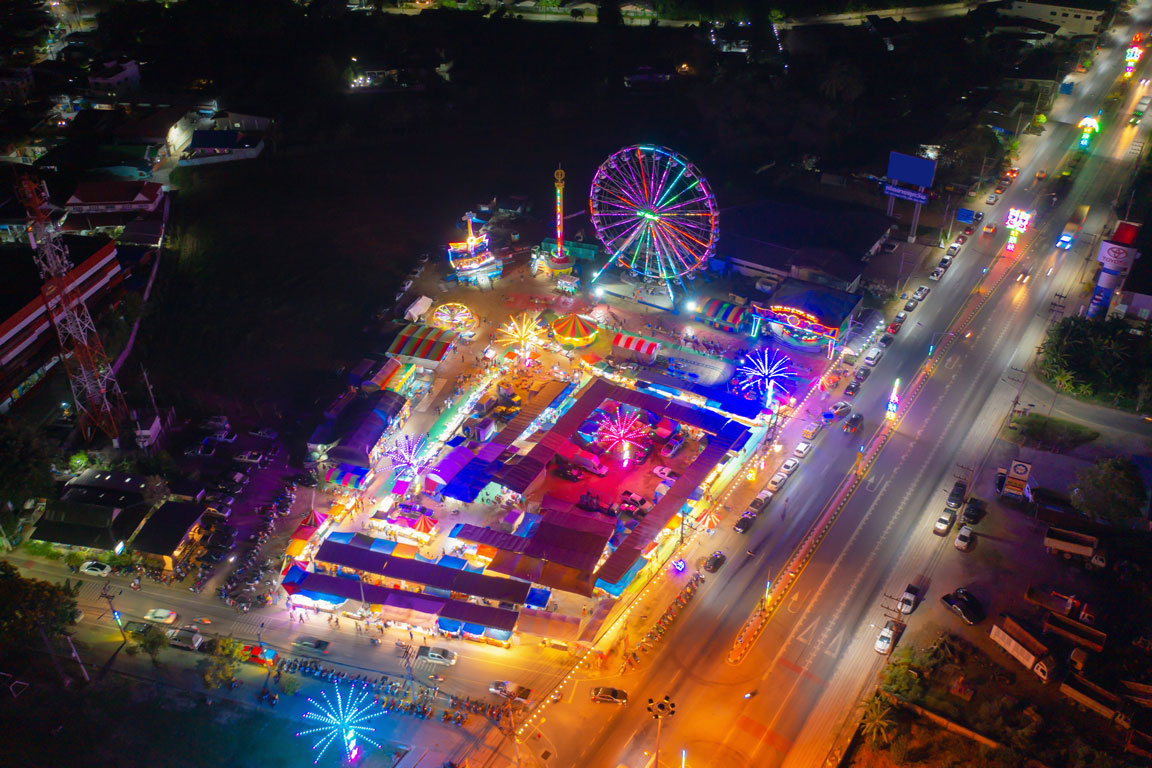 aerial-top-view-of-amusement-park-in-night night time carnival