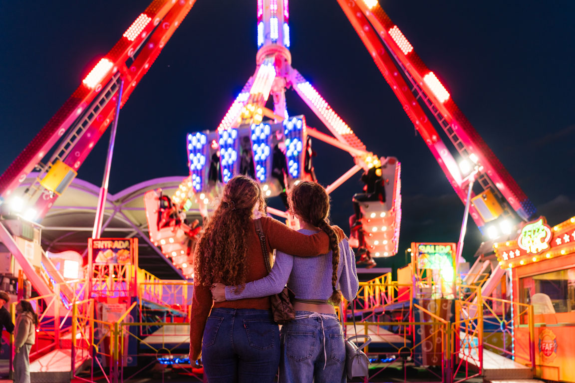 young-women-enjoying-the-carnival-amusement-ride college campus carnival event